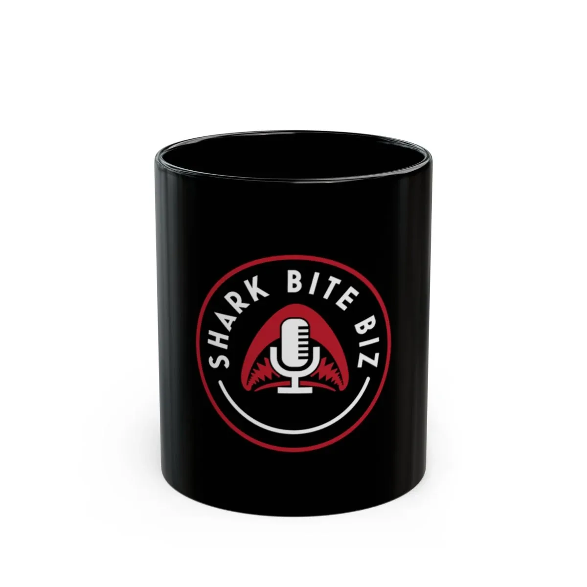 Shark Bite Biz Mug — black ceramic mug with the official Shark Bite Biz circular shark-jaws logo
